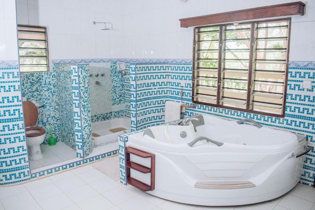 شاطئ دياني Kijani Cottages Diani المظهر الخارجي الصورة