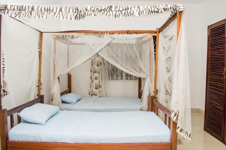 شاطئ دياني Kijani Cottages Diani المظهر الخارجي الصورة